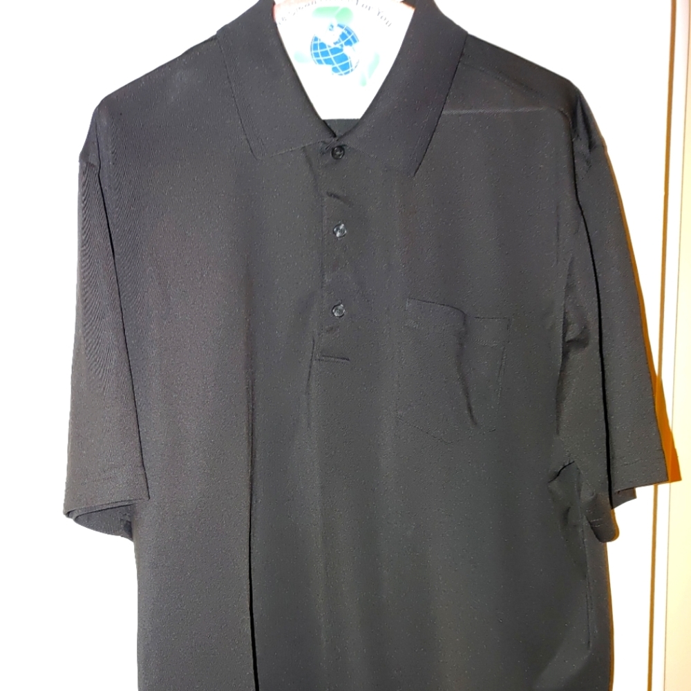 Greg Norman black golf shirt